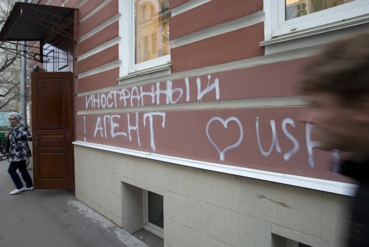 Image: The office of Memorial rights group had the words “Foreign Agent (Loves) USA\" spray-painted on its facade