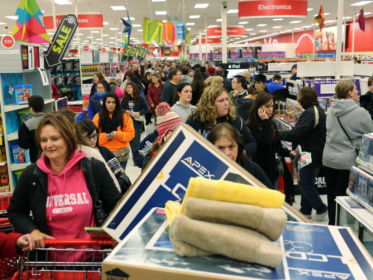 Image: People shop at a Target on Thanksgiving night in Highland, Indiana