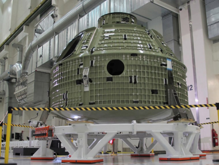 The orbital flight-model Orion capsule pictured here will have to be repaired before its flight on a Delta 4 rocket in 2014. A crack formed in its aft bulkhead during recent pressure testing at Kennedy Space Center in Florida.