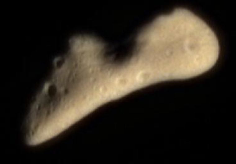 This color image of Eros was acquired by NEAR's multispectral imager on Feb. 12, 2000, at a range of 1,100 miles (1,800 kilometers). It is part of the final approach imaging sequence prior to orbit insertion and is intended to map the color properties of Eros across all of the illuminated surface.