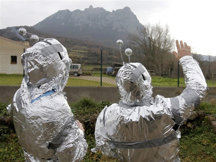 Two men dressed in tinfoil