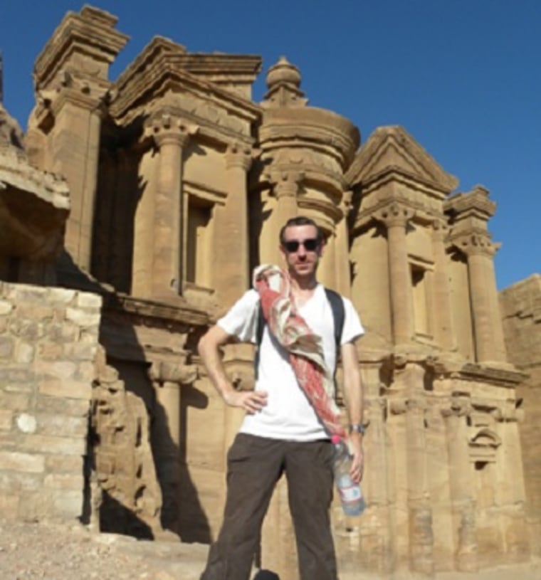 UC doctoral student Christian Cloke in front of the Monastery of Ed Deir at Petra.