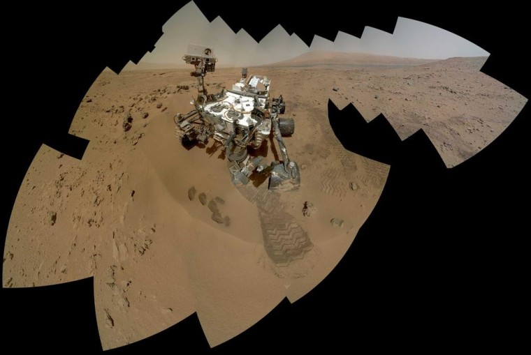 During its 84th and 85th days (sols) on Mars, Curiosity snapped this newest mosaic self-portrait.