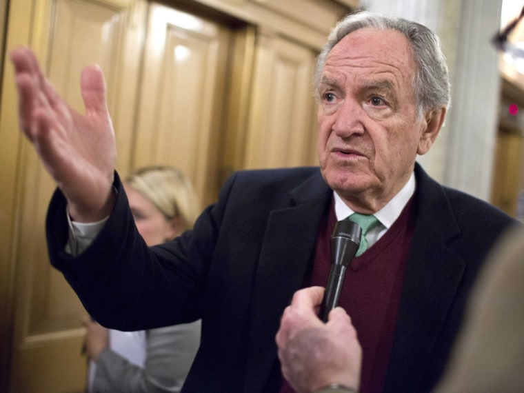 Image: File photograph of U.S. Senator Tom Harkin speaking to reporters after a vote on Capitol Hill in Washington