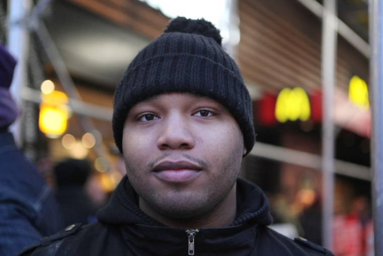 Image:Alterique Hall, a McDonald’s worker, participates in a strike outside a McDonald's restaurant Thursday, April 4, 2013, in Midtown Manhattan, New York.