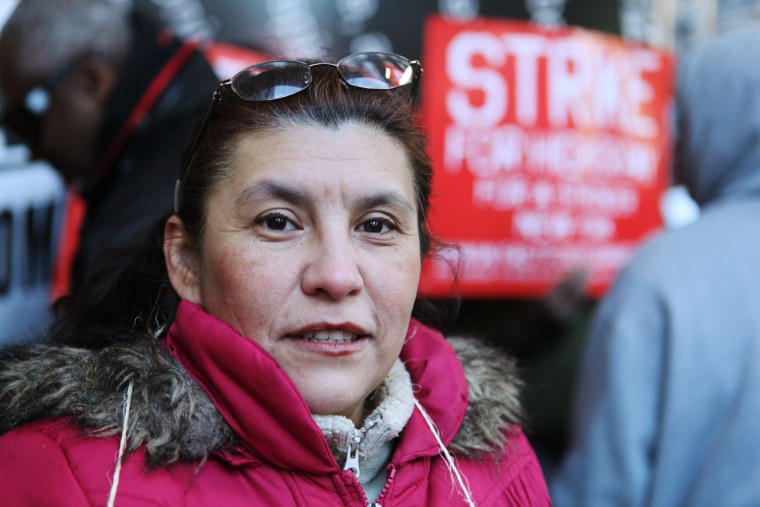 Image: Elba Godoy, a McDonald’s worker, participates in a strike outside a McDonald's restaurant Thursday, April 4, 2013, in Midtown Manhattan, New York.
