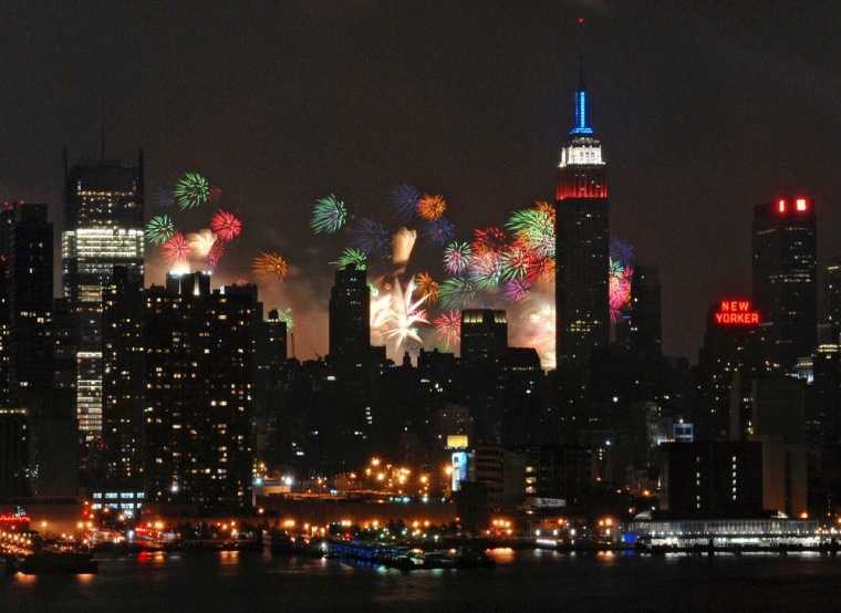 Image: Fireworks explode over the New York City skyline