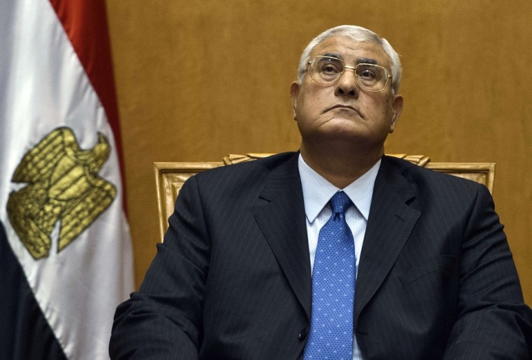 Image: Egypt's chief justice Adly Mansour pauses during his swearing-in ceremony as Egypt's interim president