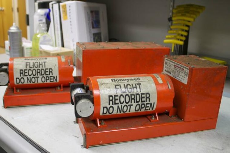 Image: Asiana flight data recorder, left, and cockpit voice recorder, right
