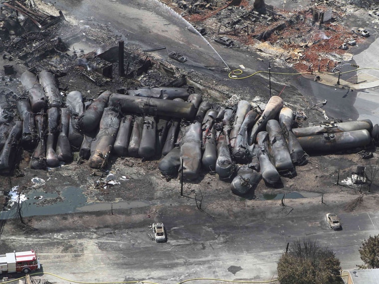 Image: An aerial view of burned train cars after a train derailment and explosion in Lac-Megantic, Quebec, on July 8.
