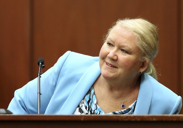 Image: LeAnne Benjamin, a friend of George Zimmerman, smiles while identifying him in court during her testimony in Zimmerman's second-degree murder trial in Sanford, Fla., on July 8.
