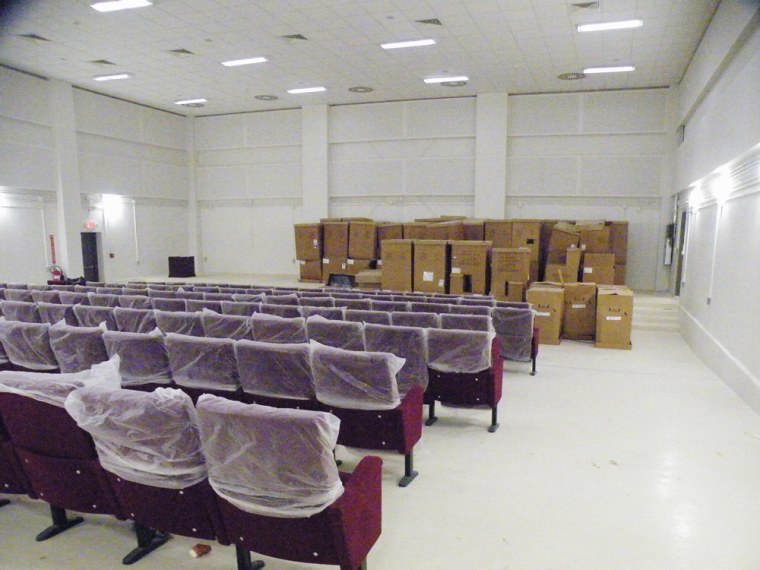 Plastic covers are still on seats inside what was designed to be a command and control facility in Helmand Province.