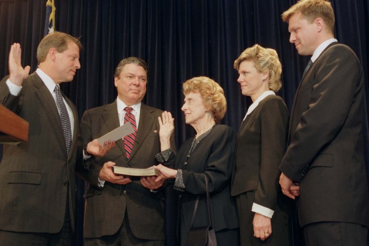 In this 1997 photo, Vice President Al Gore swears in Lindy Boggs as new Ambassador to the Vatican in Washington. With Boggs are her son Tommy Boggs, holding Bible, her daughter Cokie Roberts and her grandson Paul Sigmund.