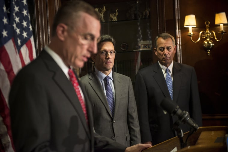Image: House Minority Leader Eric Cantor (R-Va.), center, and House Speaker John Boehner (R-Ohio), right, look on as Rep. Tim Murphy (R-Pa.) speaks.