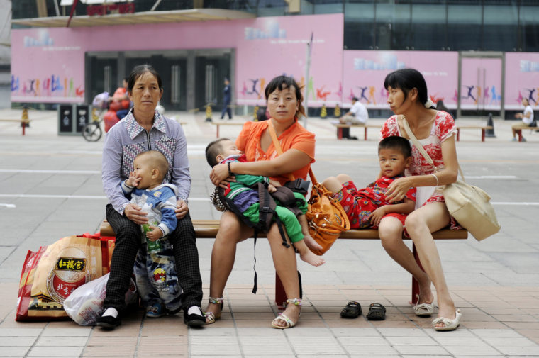 Image: Three women with their children in Beijing.