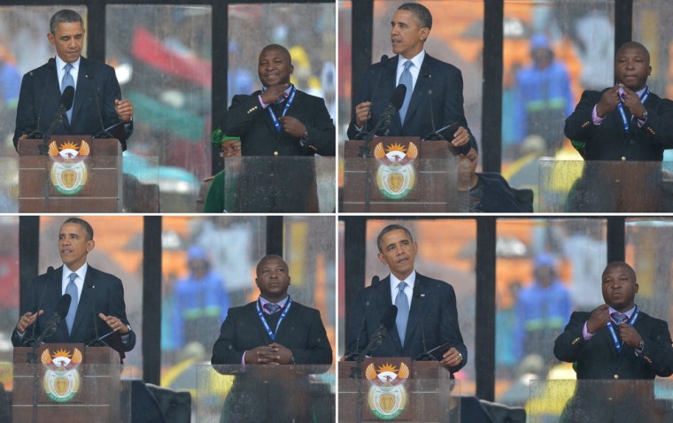President Barack Obama delivers a speech next to sign language interpreter Thamsanqa Jantjie during the Nelson Mandela memorial service on Tuesday.
