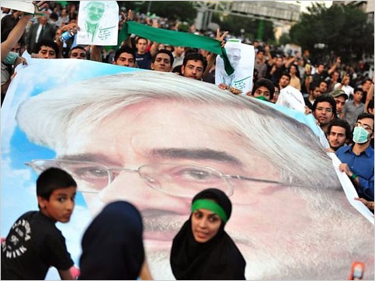 A photograph uploaded to TwitPic by a blogger who says that it shows a silent demonstration in Tehran’s Topkhone Square on Thursday.