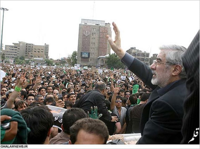 Mir Hussein Moussavi addresses supporters at a rally in Tehran on Thursday.