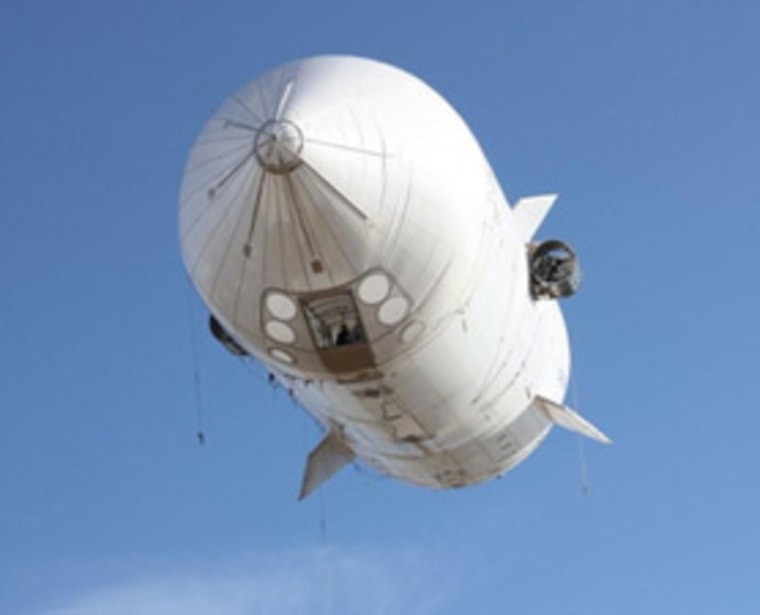 A prototype 125-foot Bullet Airship is shown in flight. The larger, 235-foot airship, called the Bullet 580 is due to be inflated later this month.