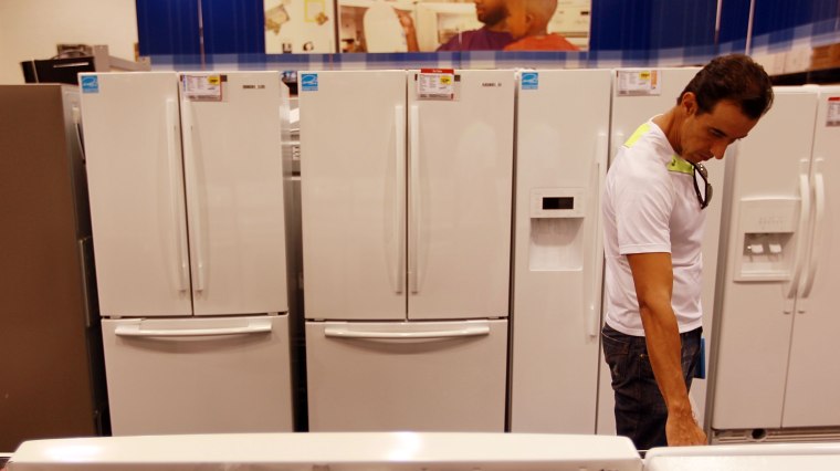 Image: Shopper checking out appliances