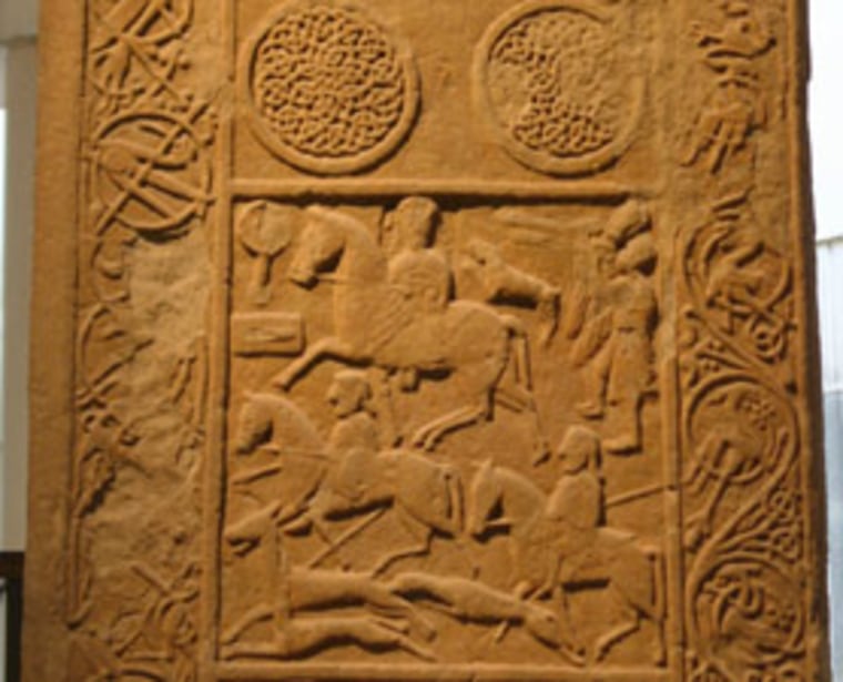 Riders and horn blowers appear next to hunting dogs on what is called the Hilton of Cadboll stone, pictured here.