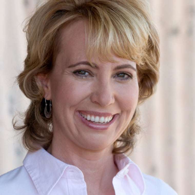 Image: U.S. Representative Gabrielle Giffords is seen with her husband Mark Kelly in an undated handout photo