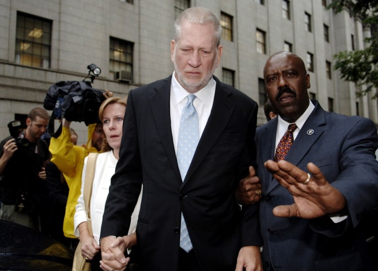 Image: Former Worldcom CEO Bernard Ebbers exits Manhattan federal court with his wife Kristie
