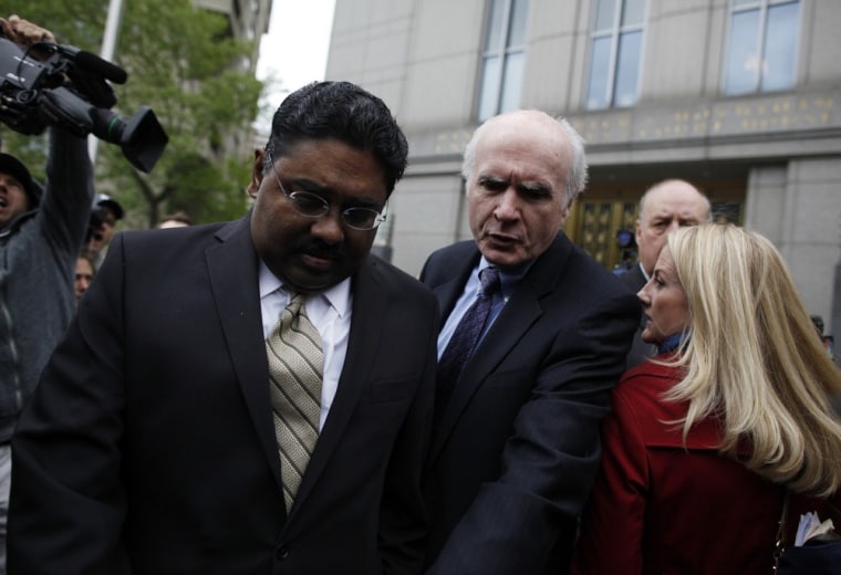 Image: Raj Rajaratnam departs with his lawyer from Manhattan Federal Court