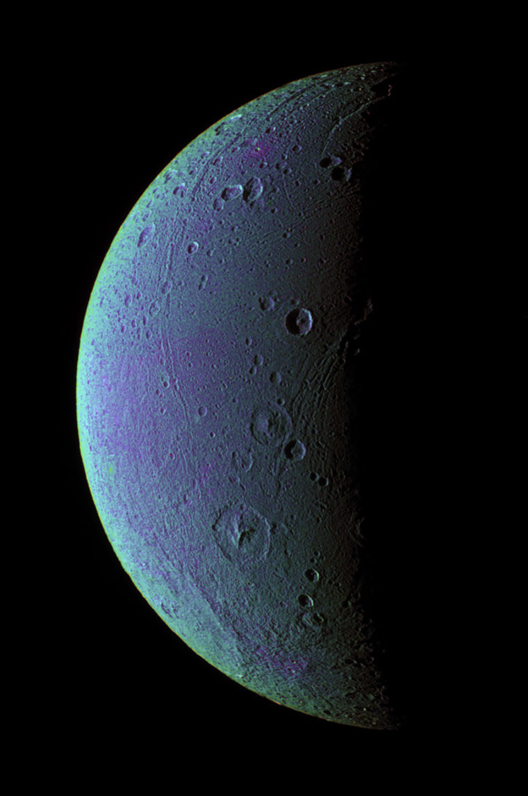 This view highlights tectonic faults and craters on Saturn's moon, Dione, an icy world that has undoubtedly experienced geologic activity since its formation. It is based on images from the the Cassini spacecraft taken on Dec. 24, 2005.