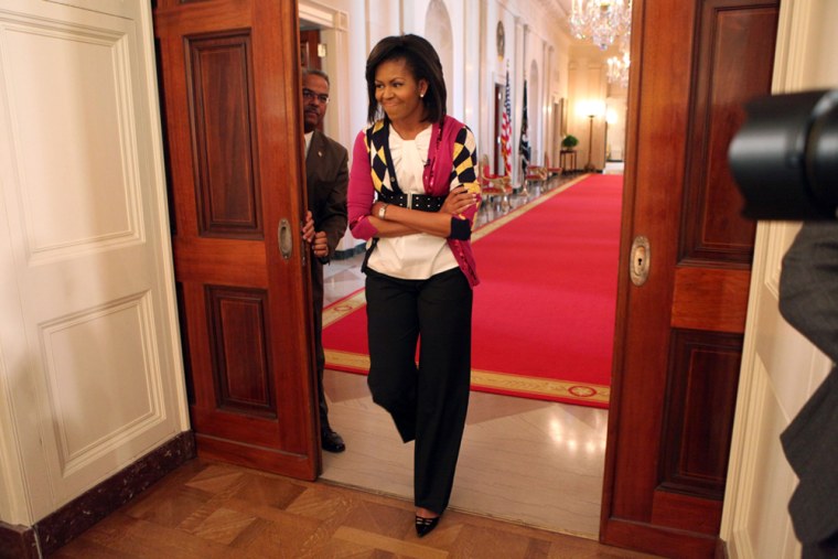 Image: Michelle Obama arrives for a \"Take Your Children to Work Day\" event at the White House.