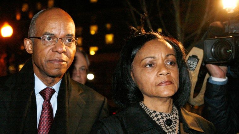 Image: U.S. former Rep. Jefferson walks with wife, after his sentencing at U.S. District Court for the Eastern District of Virginia