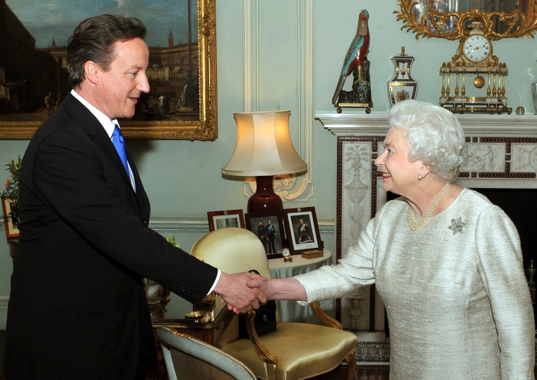 Image: Prime Minister Cameron greeted by Queen Elizabeth