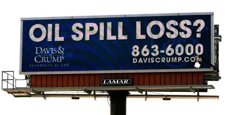 Image: A giant electronic billboard advertisement placed by a law firm is on display in Gulfport