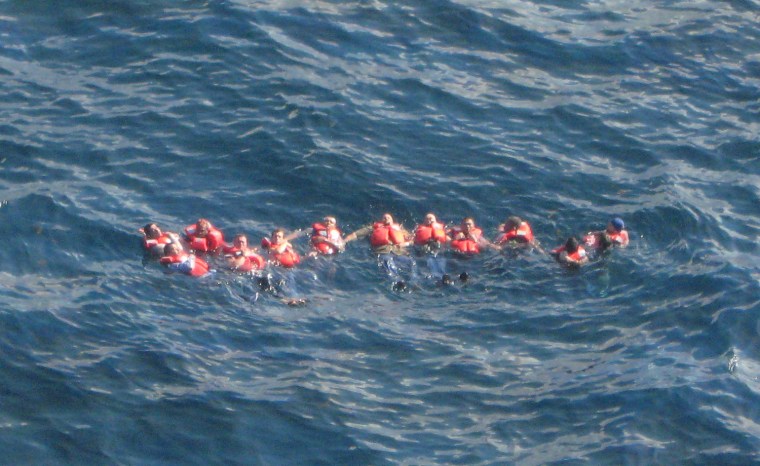 Image: People floating in lifejackets