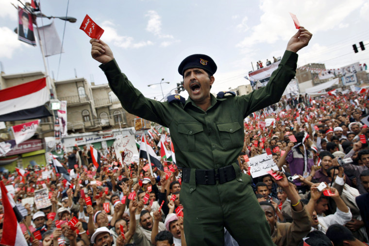 Image:A Yemeni army soldier who defected attends a demonstration against President Ali Abdullah Saleh in Sanaa