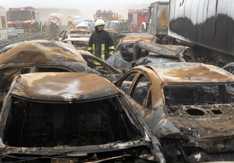 Image: Firemen at the scene of a multiple car pile-up on Autobahn A19 in Kavelstorf in Germany