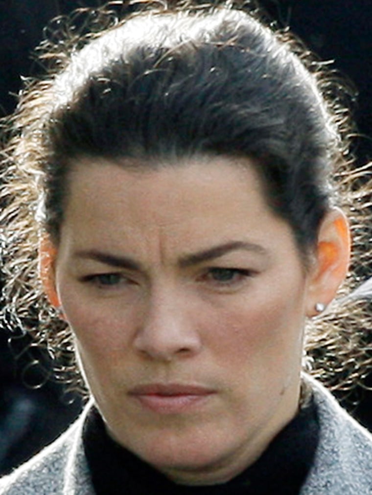 Image: Nancy Kerrigan attends her father's funeral in January 2010.