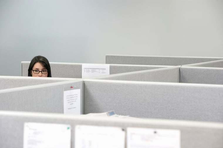 Image: Woman in cubicle