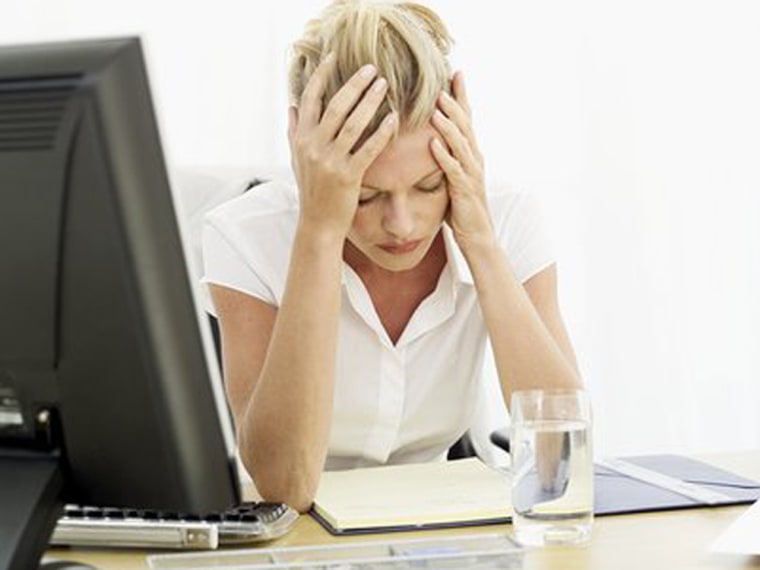Image: Tired woman with computer