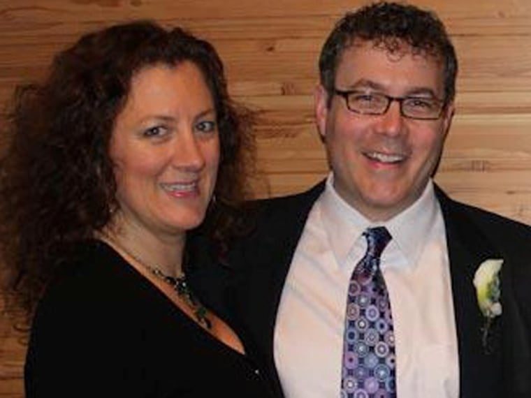 Jeff Fickes and Annie Lareau have been best friends since they were 18. Here, Lareau and Fickes embrace on Fickes' wedding day, on Sunday, Dec. 9, 2012, at Seattle City Hall. Lareau was the maid of honor at Fickes' wedding, and Fickes was Lareau's