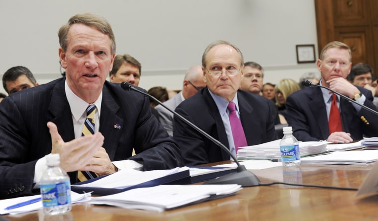 Image: Auto executives speak at a hearing of the House Financial Services Committee