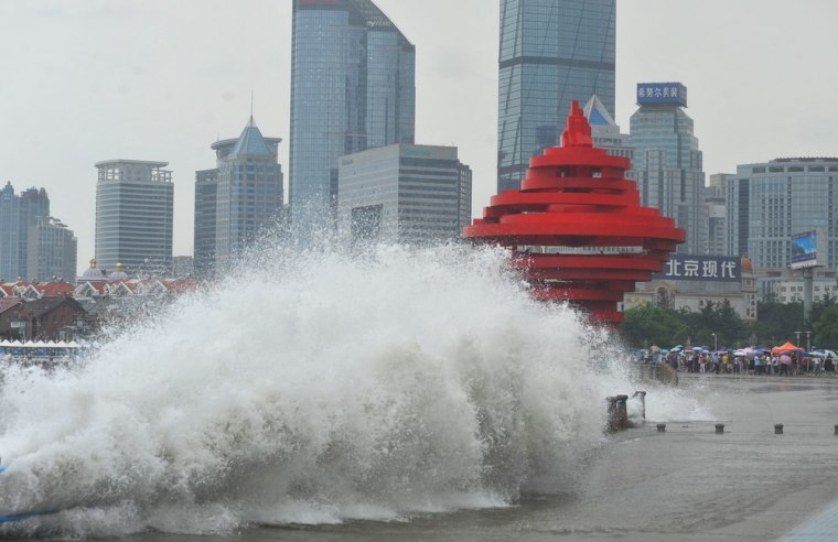 Image: A large wave hits the coast at Qingdao city, eastern China