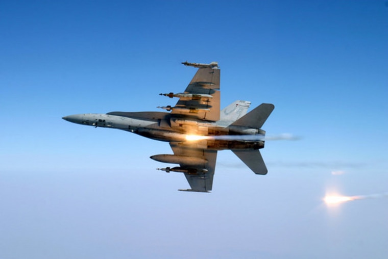 F/A-18C assigned to the “Knighthawks” of Strike Fighter Squadron One Three Six (VFA-136) tests its flare countermeasure system before heading into Afghanistan on a close air support mission.