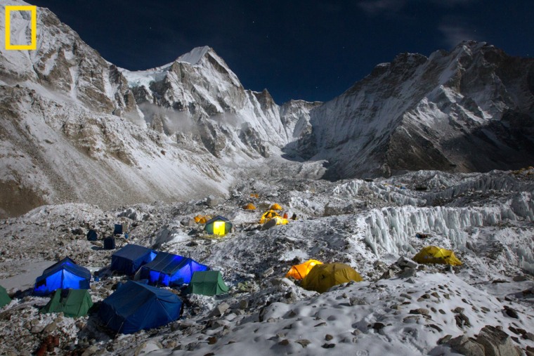 Everest Base Camp and the Khumbu Glacier glow beneath a full moon. 