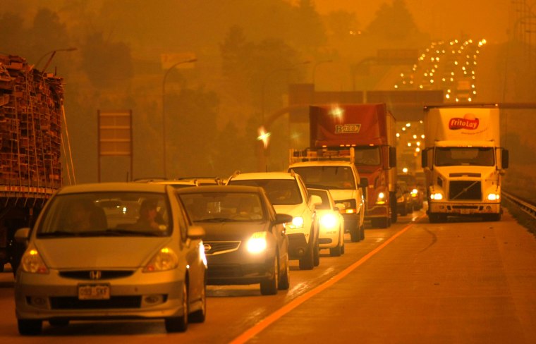 Image: Smoke from the Waldo Canyon fire engulfs a highway in Colorado