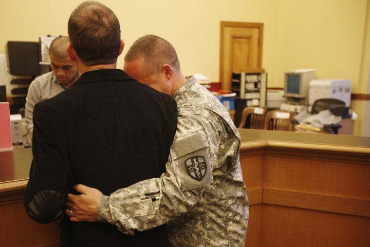 Image: U.S. Army Captain Michael Potoczniak and partner Todd Saunders obtain their marriage license at City Hall in San Francisco