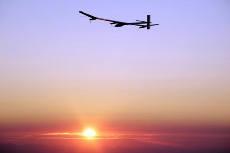 The solar-powered Solar Impulse aircraft during its first night flight.