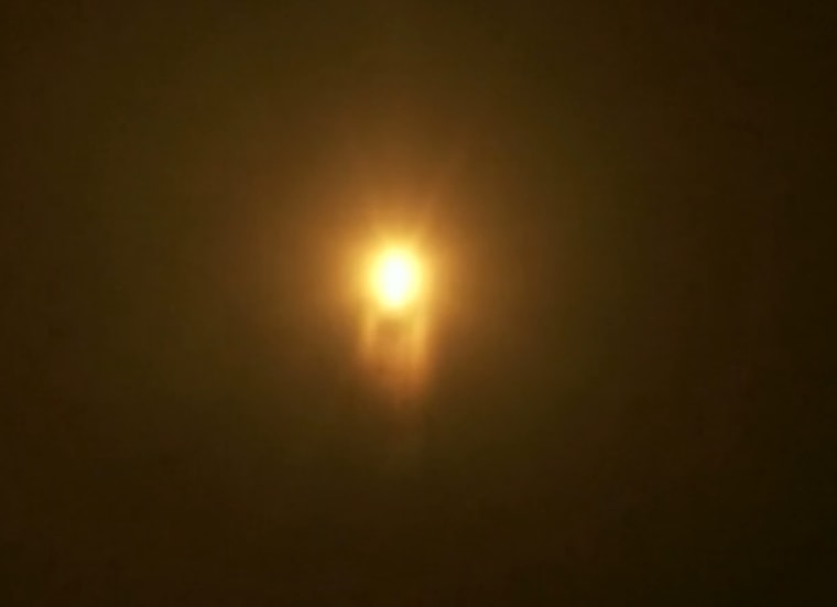 This screenshot shows a plume billowing from the base of SpaceX's Falcon 9 rocket about 79 seconds into its launch on Oct. 7, 2012. The Falcon 9 successfully delivered SpaceX's robotic Dragon capsule to orbit on the first bona fide private cargo mission to the International Space Station.