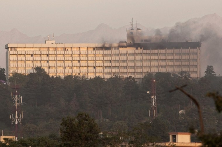 Image: Smoke billows from the Intercontinental hotel during a battle between Afghan security forces and suicide bombers and Taliban insurgents in Kabul