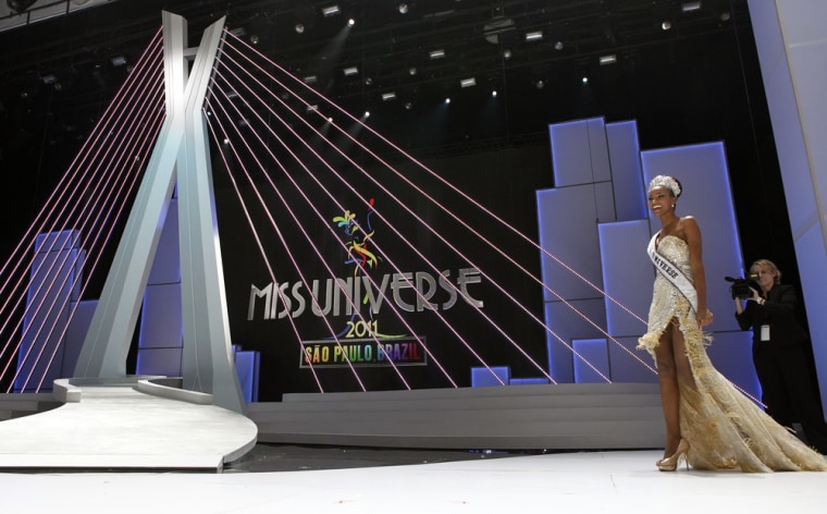Image: Miss Angola Leila Lopes appears on stage for a news conference after she was crowned Miss Universe 2011 in Sao Paulo